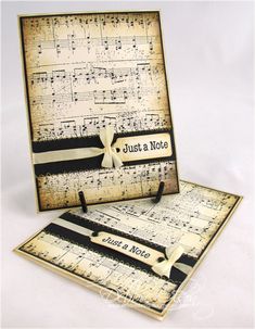 a card with music notes on it and a ribbon tied around the front of it