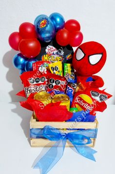 a basket filled with candy and balloons