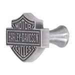 the harley davidson emblem is shown on this metal bottle opener, which has been made to look like an old motorcycle