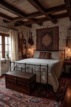 a bedroom with a bed, rug and two lamps