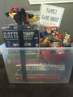 a plastic container filled with games and snacks