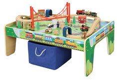 a toy train table with cars and trucks on it for children's play time