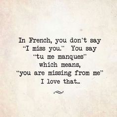 an old typewriter with the words in french, you don't say i miss you