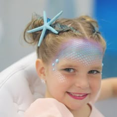 These Hairclips are a fun way to add a touch of mermaid to any look. Thanks to our non-slip grosgrain ribbon clip, our starfish hair clips are great for children, kids of all ages, festivals, and more!  These starfish are real and vary in size/shape. Most range around 4 inches in diameter.  Made sustainably in Ocean City, New Jersey, our starfish hair clips are a big hit in our children's salon Bowfish Studios!  Disclaimers:   Due to this being a handmade product and derived from real starfish, Childrens Salon, Mermaid Face Paint, Mermaid Hair Clip, Mermaid Makeup Halloween, Island Hair, Costume Mermaid, Ocean City New Jersey, Starfish Hair Clip, Mermaid Halloween Costumes