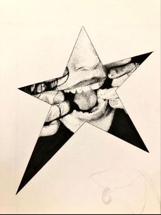 a black and white drawing of a hand holding a star