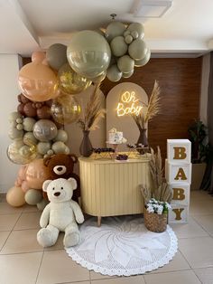 a baby shower with balloons and teddy bears