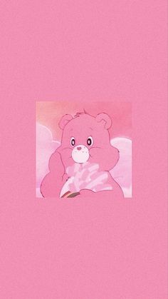 a pink background with a teddy bear holding a piece of paper in it's paws