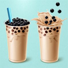 two cups filled with milk and blueberries next to each other on a blue background