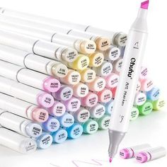 the marker pens are lined up next to each other and have different colors on them