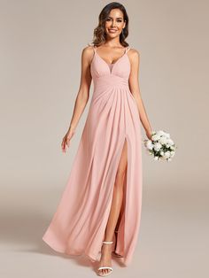 Introducing our stunning Plunging Neck Split Spaghetti Strap Back X-Cross Bridesmaid Dress, a captivating blend of allure and sophistication. This mesmerizing dress features a figure-flattering waistline that accentuates the natural curves for an elegant and feminine look. The alluring spaghetti straps delicately cross at the back, adding a touch of modern elegance and ensuring a secure and comfortable fit. With its enticing side split, this dress exudes a sense of understated glamour, making it Plunging Neck Dress, Plunging Neck, Women Formals, Formal Dresses For Women, Formal Dresses Prom, Feminine Look, Side Split, Glamorous Evening Gowns, Flowing Maxi Dress