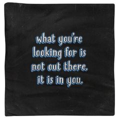 a black towel with the words what you're looking for is not out there