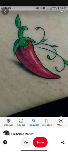 a tattoo with a red pepper on it