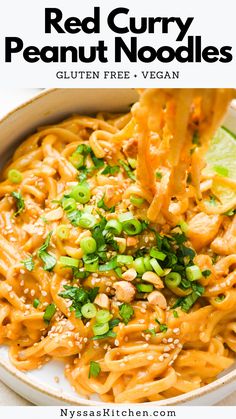 red curry peanut noodles in a bowl with chopsticks