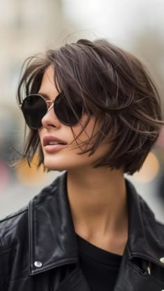 Elevate your image with a stunning layered bob haircut. Explore 25 unique variations that cater to different hair textures and face shapes. From subtle layers to dramatic choppy cuts, find the perfect balance of volume and structure. These versatile bobs offer endless styling options, from sleek and polished to tousled and carefree. Embrace a timeless look that's both sophisticated and easy to maintain. Volume Bob Haircut, Bob Hairstyles One Length, Medium Bob Haircut For Fine Hair, Natural Hair Short Bob, Layered Bob Asian Hair, Layered French Bob, Braids On Short Natural Hair, Black Woman Braids, Bob With Volume