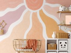 a baby's room decorated in pastel colors and wicker baskets on the shelves