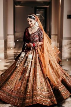 Bridal Lehenga Golden Indian Weddings, Bridal Lehenga Looks Indian Weddings, Red Bridal Heavy Lehenga, Maroon And Rust Bridal Lehenga, Rajstani Bridal Lehenga, Wedding Lehenga Maroon, Red Golden Bridal Lehenga, Maroon Red Bridal Lehenga, Maroon And Orange Bridal Lehenga