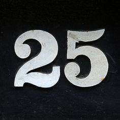 the number twenty five is shown in white