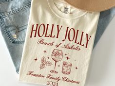 Perfect for spreading cheer, this festive shirt lets you add your personal touch with custom colors and text. Made for cozy gatherings, holiday photos, and creating merry memories, it's a must-have for a joyful season, regardless of how dysfunctional your family may be. Deck out your whole crew in style and let the holiday fun begin! Customize with your favorite color and personalized lines of text. Both short and long sleeve options are available, along with an assortment of colors and sizes. Customizable Cotton Tops For Holidays, Christmas Party Shirt, Office Christmas Party, Christmas Party Shirts, Festival Shirts, Office Christmas, Family Christmas Shirts, Color Swatch, Christmas Tees