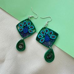 Handmade paper quilled earrings that are lightweight and classy.  These are made of paper but are coated with two coats of varnish. They are waterproof but please handle with care. Care instructions for handmade jewelry: We use clear acrylic sealant to provide extra sturdiness to the jewelry. Our earrings will withstand the daily wear including light sweat, moisture, splashes of water but are not 100% water-proof. Avoid swimming or showering with them! If the product does gets in contact with water, wipe it with a paper napkin, allow it dry with natural air and it will return to the original condition! Filigrana Jewelry, Quilled Earrings, Paper Jewellery, Quilling Earrings, Quilled Jewellery, Quilling Jewelry, Paper Quilling Designs, Care Care, Spring Earrings