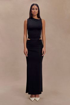 Redefine elegance. The KAIA Slinky Cut Out Maxi Dress combines sleek design with statement details. Featuring an asymmetrical neckline with elegant ruching, this bodycon dress sculpts the silhouette while the cutout details at the hips add a daring touch. The ruching at the waist enhances the shape, and the maxi length exudes timeless allure. Fully lined for comfort and a flawless fit, the Kaia Dress is the ultimate blend of modern glamour and refined elegance. Workwear Capsule Wardrobe, Cut Out Maxi Dress, European Summer Outfits, Maxi Dress Sale, Asymmetrical Neckline, Beige Dresses, Crepe Dress, Long Black, Spring Dresses