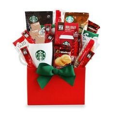 a starbucks bag filled with coffee and snacks