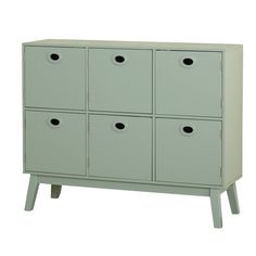 a green cabinet with four drawers and two doors