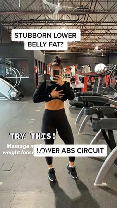 a woman taking a selfie in the gym