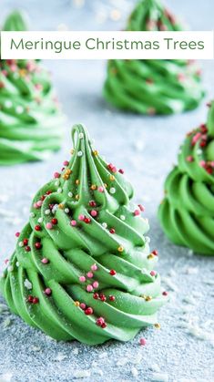 green meringue christmas trees with sprinkles on the top and bottom