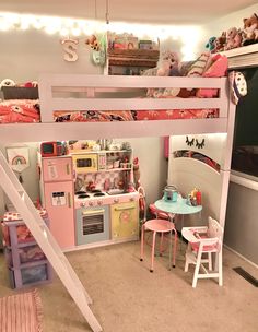 a child's bedroom with bunk beds, desks and toys on the floor