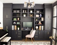 a living room filled with furniture and a piano