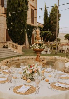 a table with place settings is set outside