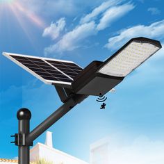 a solar powered street light with blue sky in the background