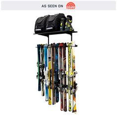 a rack with skis and snowboards hanging from it