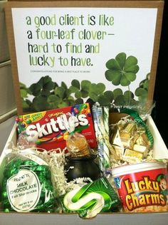 a st patrick's day gift box filled with candy, snacks and goodies