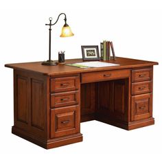 a wooden desk with drawers and a lamp on it's side, in front of a white background