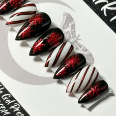 "Welcome to LD Nails!  Hi, I'm Bur and I'll be your long distance nail ghoul 😜 Read on for the obligatory written description of what you see in the pictures, plus some other important stuff..  🖤 One set of 10 REUSABLE Press On Nails 🖤     🖤 Made to order in your shape & size 🖤  Christmas Chrome: Black, white and red gothic Christmas press on nail set with hand painted red chrome snowflakes and striping detailing.  👉 Please leave your finish preference and (if applicable) custom sizing in the personalization box!  Est. 2020: LD Nails specializes in custom Gothic, Witchy and Alternative Press On Nails. I draw inspiration from what I love, so you'll find heavy gothic influences to much of the offerings in my shop!  5 ⭐️ Rating on Etsy & 1000's of orders shipped between this shop and my Alternative Holiday Nails, Holiday Horror Nails, Red And Black Winter Nails, Red Black And White Acrylic Nails, Spooky Winter Nails, Spooky Xmas Nails, Black Candy Cane Nails, Red And Black Nails Christmas, Dark Christmas Nail Ideas