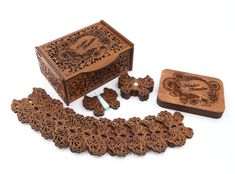 an intricately carved wooden box and matching jewelry