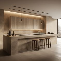 a modern kitchen with two stools next to the counter and an island in front of it