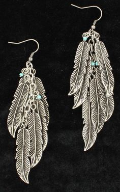 Feather Drop Silver Earrings with Turquoise Accents This earring set has a native flair with its Multicolorple dangling feathers. There is a fishhook closure. Details: Earrings Native Flair Dangling Feathers Fishhook Closure Nickel & Lead Free Earrings Feather, Trendy Jewerly, Buying Gold, Hammered Hoop Earrings, Turquoise Accents, Bar Stud Earrings, Opal Earrings Stud, Feather Jewelry, Womens Jewelry