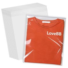 an orange love bb t - shirt with white lettering on the front and back side