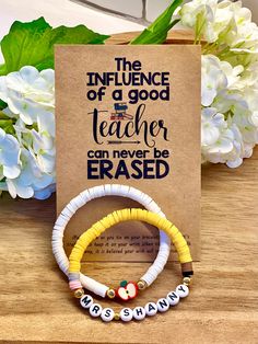 two bracelets that say the influence of a good teacher can never be erased