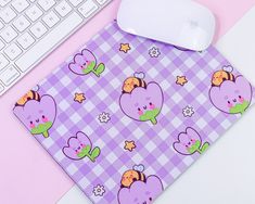 - D E S C R I P T I O N -   Well isn't bumblebutt looking rather adorable on this pastel lilac Gingham, rectangular Mousepad, with his lil tulip frens! Hand-printed in my little studio these adorable kawaii mouse mats will brighten up your desk and put a smile on your face hehe!  ----------------------------------------------------- - S I Z E S & M A T E R I A L S  - - These mouse pads are 23.5 x 18cm and have a wonderfully luxurious 5mm thickness - The mousepad is 5mm Thick neoprene rubber, wit Lilac Gingham, Kawaii Mouse, Kawaii Desk, Pastel Lilac, Pastel Decor, Neoprene Rubber, Kawaii Gifts, Office Items, Bee Gifts