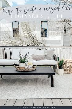 a white couch sitting on top of a wooden table