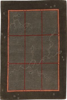 an area rug with squares and lines on the ground in grey, red and brown colors