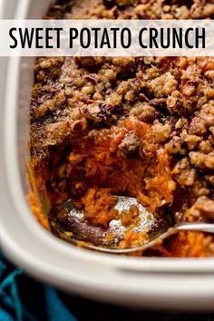 sweet potato crunch casserole in a white dish with a spoon