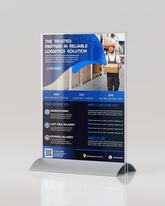 a blue and white business flyer with a man holding a box on it's back