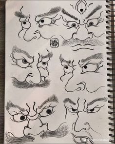 an open notebook with drawings of different facial expressions and eyes on the page, which is also in black ink