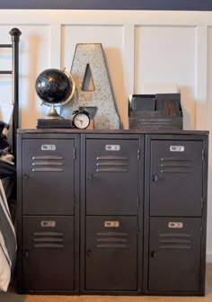 the lockers are next to each other in front of a wall with letters on it