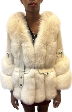 Natural cross fox fur and leather jacket. Double clip closure. Available in sizes small, medium, and large. Luxury Sheepskin Fur Coat With Faux Fur Lining, Luxury Faux Fur Outerwear, Luxury Fur Coat With Feather Trim For Winter, Luxury Winter Fur Coat With Feather Trim, Luxury Faux Fur Winter White Outerwear, White Luxury Faux Fur Coat, Luxury White Faux Fur Coat, Luxury Sheepskin Fur Coat With Faux Fur Trim, Luxury White Fur Coat With Faux Fur Lining