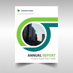 a green and white annual report cover with cityscape in the background, on top of a gray surface